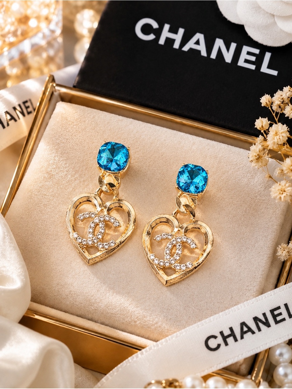 Gold Heart Drop Earrings with Blue Stones